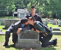 SAME SEX COUPLES MAKE OUT ON GRAVE2